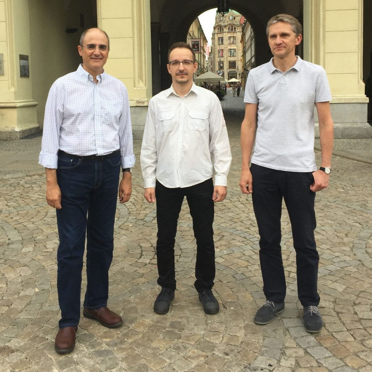 Three men standing