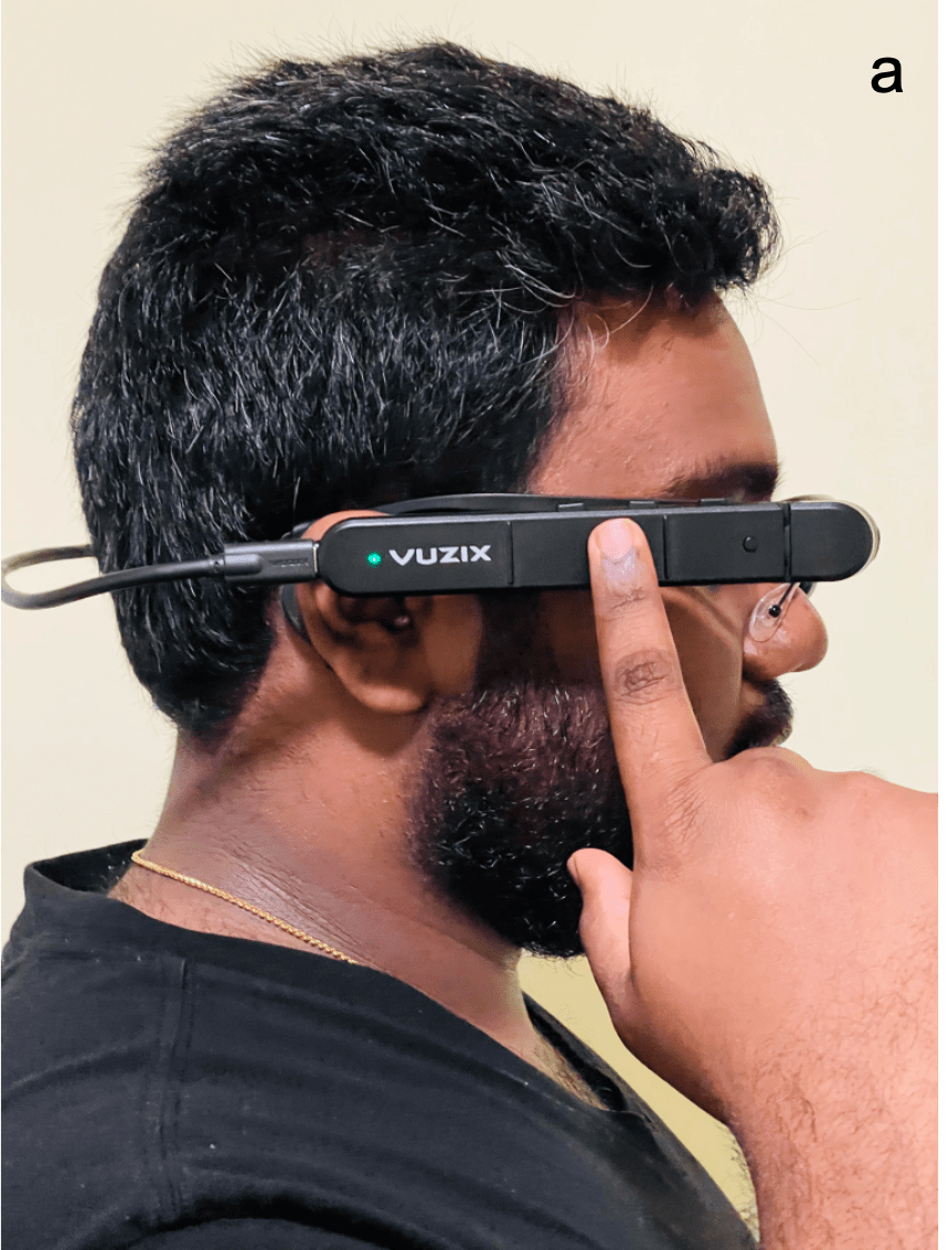 A student demonstrates a pair of tech-infused glasses